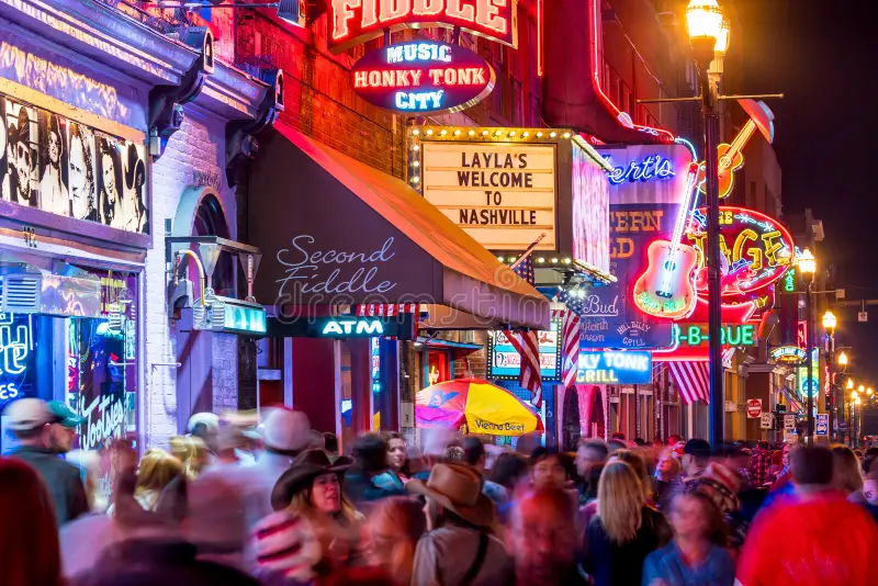Neon lights of the honky tonk bars on Broadway in Nashville
